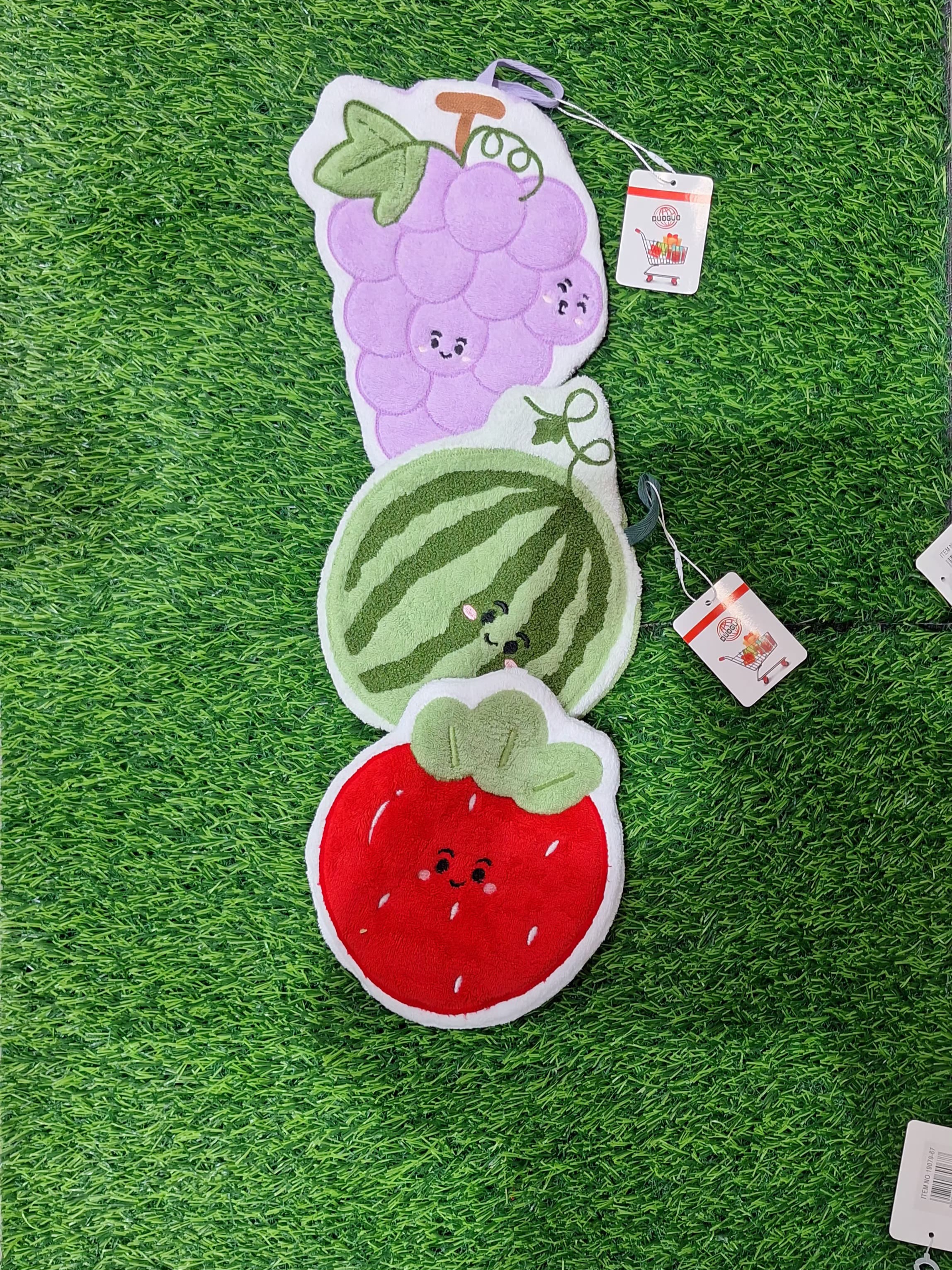 Tapo para manos con decoración de frutas